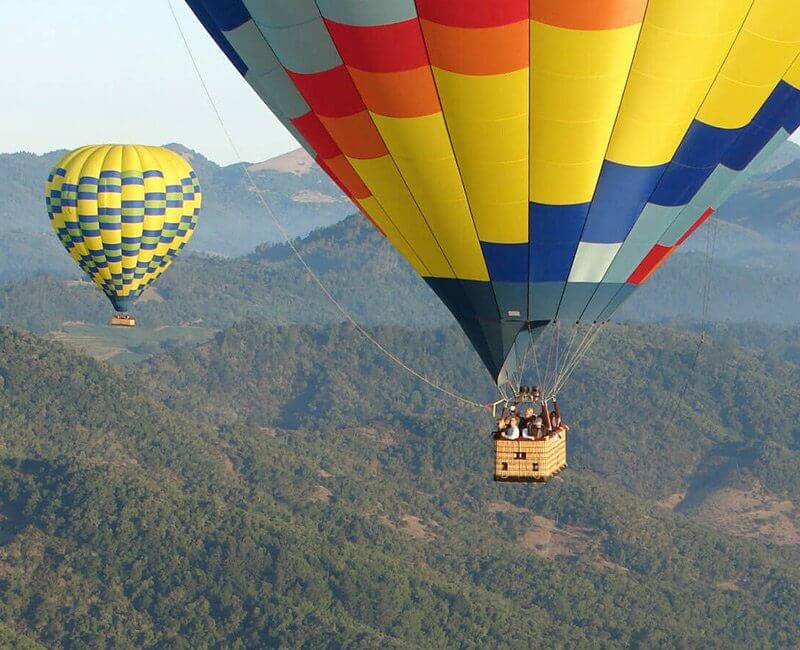Balloons Above the Valley