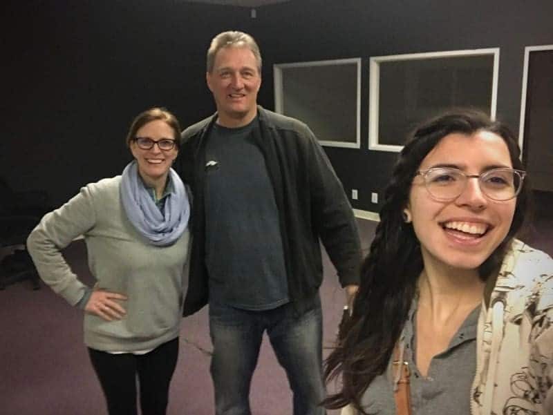 group of people standing in empty office