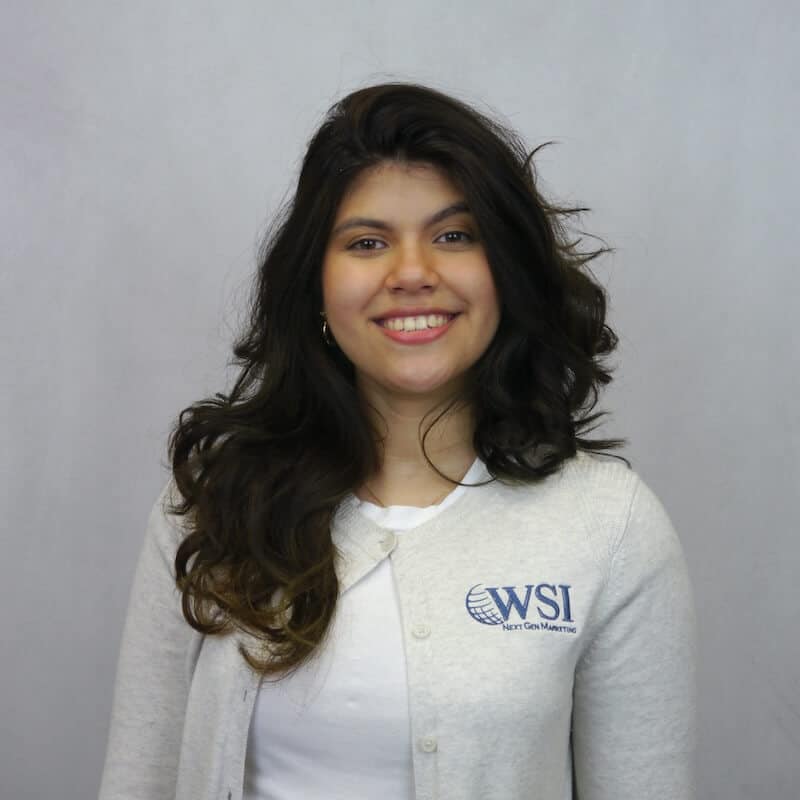 chris smiling wearing wsi shirt