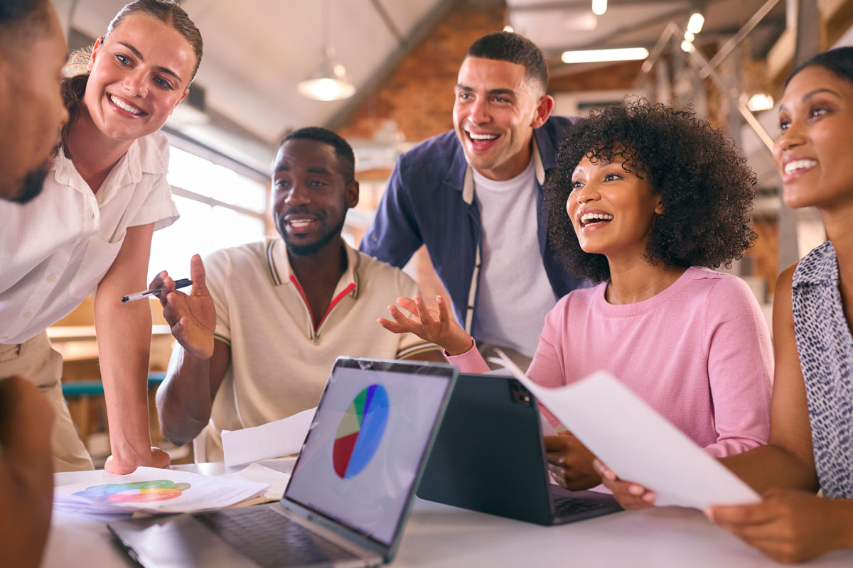 group looking at results of a google search at work